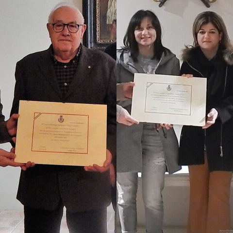 Salutati e premiati in Comune Enzo Sassolini di “Busatti stoffe” e la famiglia Luchetti del forno di Pierantonio per aver contribuito alla crescita del commercio e dell'artigianato 